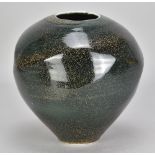 JOANNA HOWELLS (born 1960); a faceted porcelain jar covered in teadust and tenmoku glaze,