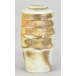 JACK DOHERTY (born 1948); a ribbed porcelain jar covered in soda vapour glaze, incised mark,