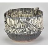 JOHN HOLT; 'Flow Pot', an earthenware vessel with applied straps and deeply incised decoration,