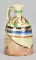 ALFARERIA ALMARZA for Ubeda Pottery, Andalucia; a slipware flagon with incised decoration, incised