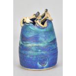 RONNIE FULTON (born 1958); a stoneware pot covered in copper barium glaze with (literally) a wavy