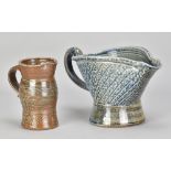 JANE HAMLYN (born 1940); an oval salt glazed jug, impressed JH mark (glaze filled), height 16cm, and