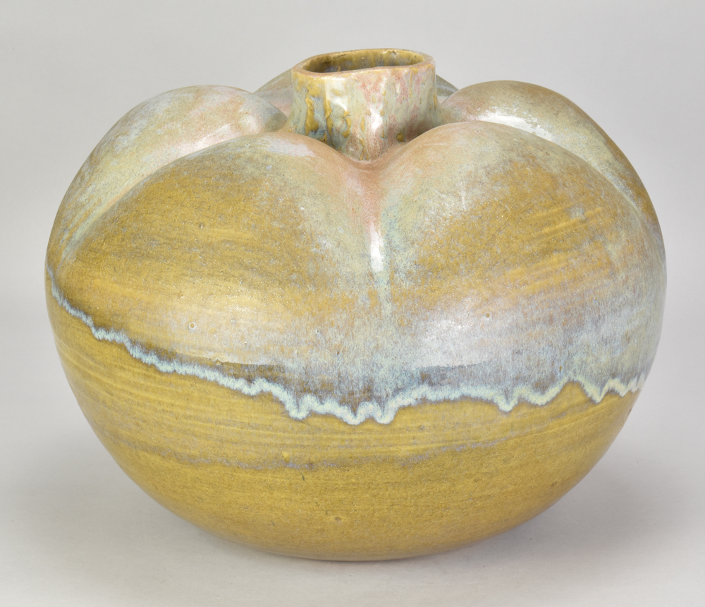 ABDO NAGI (1941-2001); a large stoneware pumpkin form partially covered in olive green glaze with