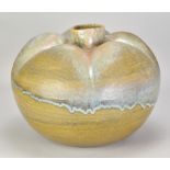 ABDO NAGI (1941-2001); a large stoneware pumpkin form partially covered in olive green glaze with