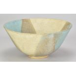 MARY WHITE (1926-2013); a large stoneware bowl covered in turquoise, oatmeal and mottled iron glaze,