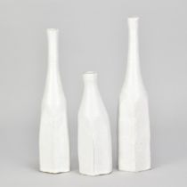 AKIKO HIRAI (born 1970); a set of three stoneware Morandi bottles covered in white glaze, incised AH