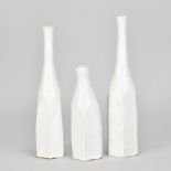 AKIKO HIRAI (born 1970); a set of three stoneware Morandi bottles covered in white glaze, incised AH