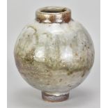 JAMES HAKE (born 1979); a stoneware moon jar covered in shino glaze, impressed JH mark, height 18.