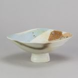 JACK DOHERTY (born 1948); a porcelain square pedestal dish covered in soda vapour glaze, impressed