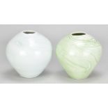 JOANNA HOWELLS (born 1960); a pair of porcelain jars covered in celadon glaze with sprigged