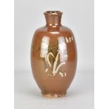 JIM MALONE (born 1946); a stoneware bottle covered in kaki glaze with wax resist decoration,