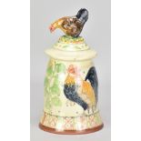 MAUREEN MINCHIN (born 1954); a slip decorated earthenware jar and cover depicting cockerels with the