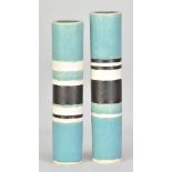 ABIGAIL SIMPSON (born 1964); a near pair of cylindrical stoneware vessels decorated with bands of