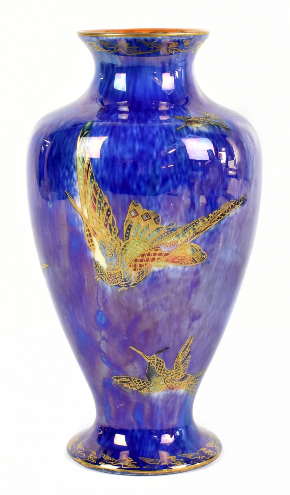 WEDGWOOD; a lustre vase, decorated with birds against a mottled blue ground, height 21.5cm.