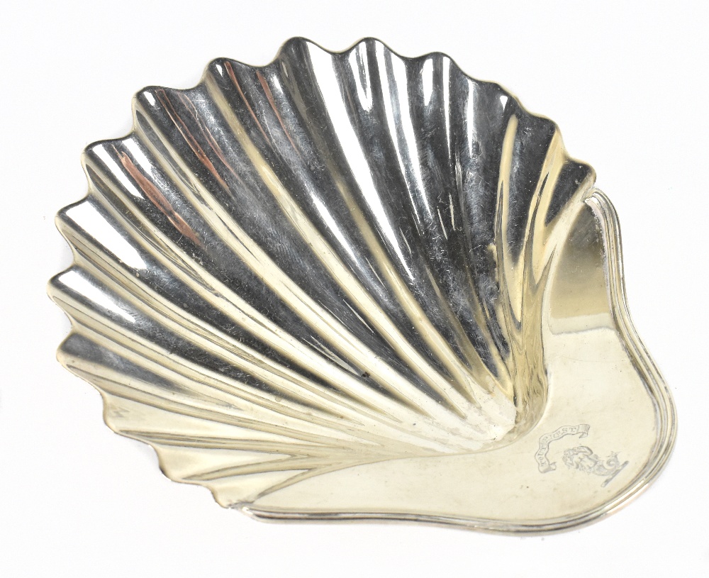 A George III hallmarked silver shell shaped butter dish with engraved armorial, London 1792,