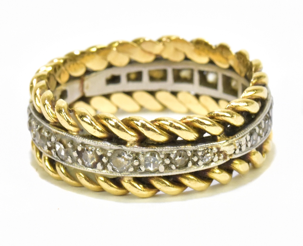 An unmarked yellow metal twisted rope style diamond band full eternity ring set with brilliant cut