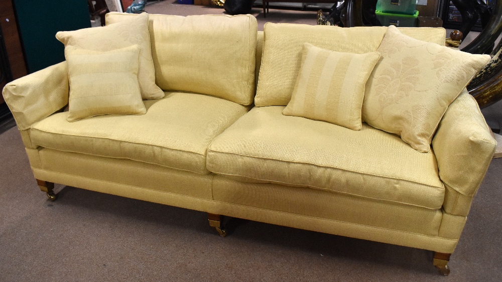 A pair of good quality reproduction Knowle sofas, on substantial square supports with brass castors. - Image 2 of 2