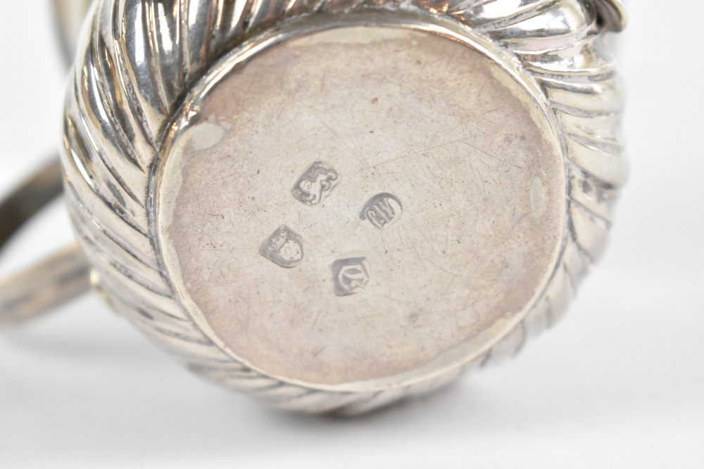 A George III hallmarked silver porringer, with part embossed decoration and inscribed 'Flint - Image 2 of 2