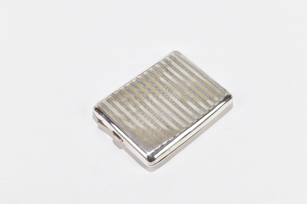 ROBERT CHANDLER; an George V hallmarked silver cigarette case of rectangular form with engine turned - Image 2 of 3