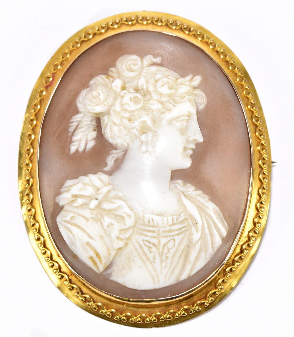 A 9ct yellow gold cased well carved cameo brooch depicting the profile portrait of a young woman,