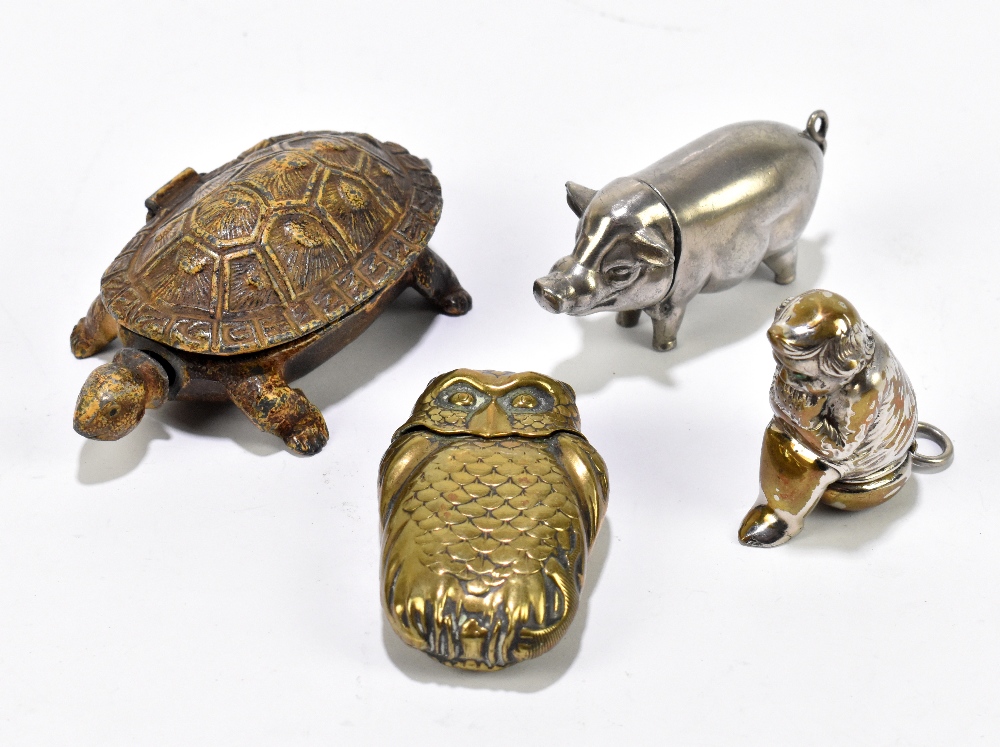 A collection of four late Victorian novelty vesta cases, including one modelled as a tortoise, a
