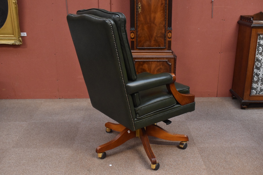 A reproduction mahogany and green leather swivel office chair.Additional InformationSwivel is - Image 4 of 4
