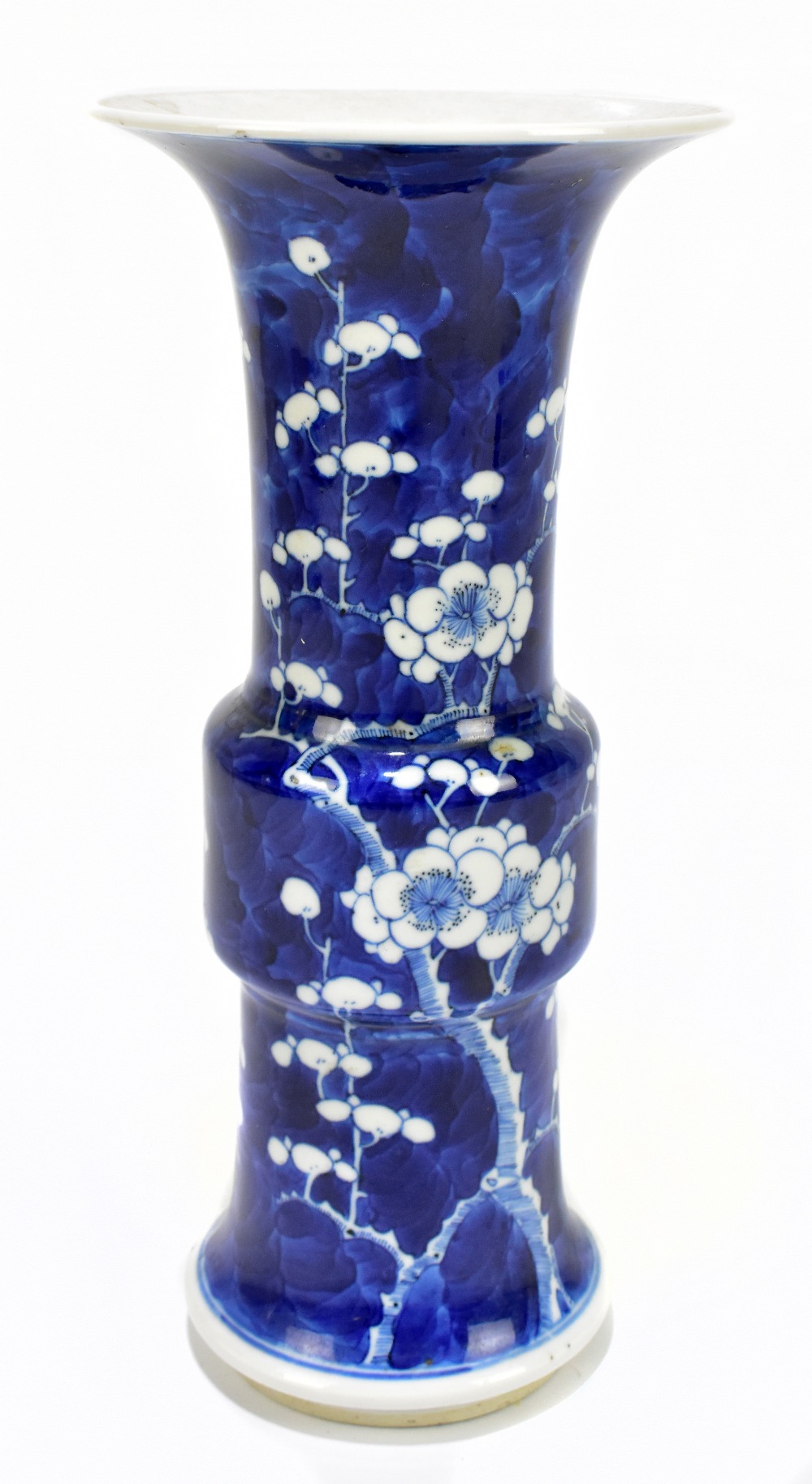 A 19th century Chinese blue and white porcelain gu vase decorated with prunus flowers, bears