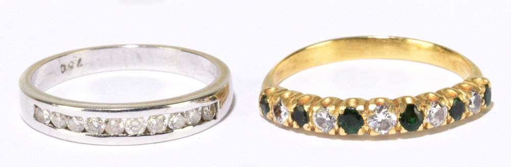 An 18ct white gold and ten stone channel set diamond ring, size L, approx. 2.4g, and a yellow