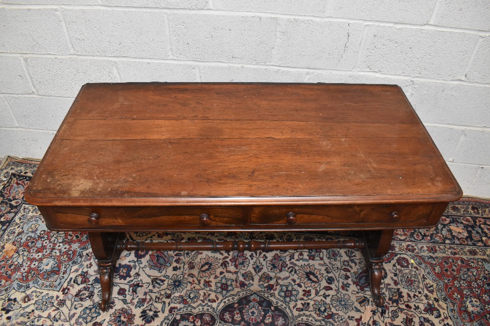 A 19th century rosewood library table, the rounded rectangular top above two frieze drawers, on lyre - Image 2 of 2