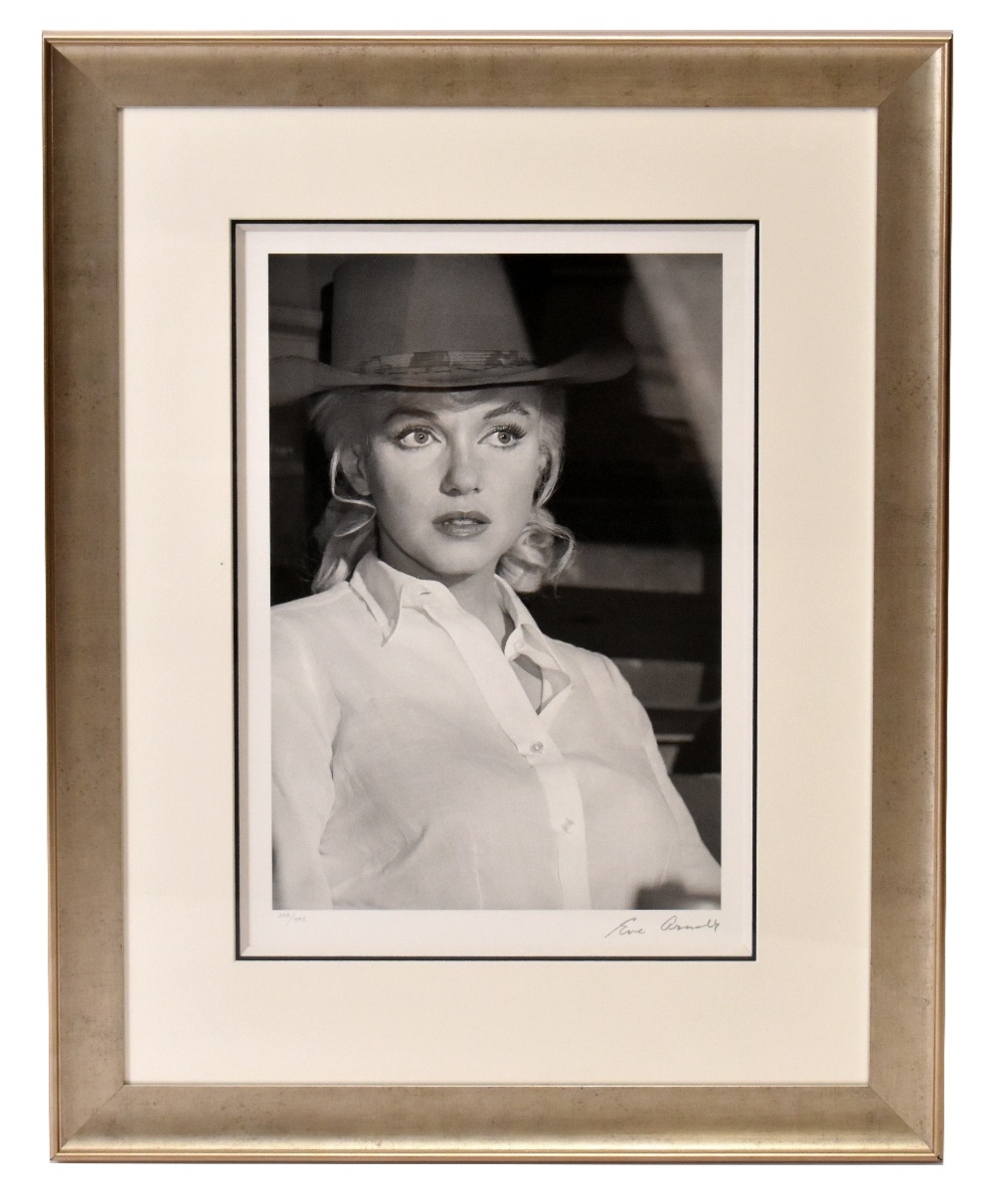 AFTER EVE ARNOLD; a reproduced black and white coloured print, 'Marilyn Monroe', with facsimile