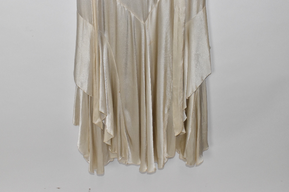 A 1920s handmade cream silk and lace beaded wedding dress decorated with sequins and beads, - Image 2 of 4