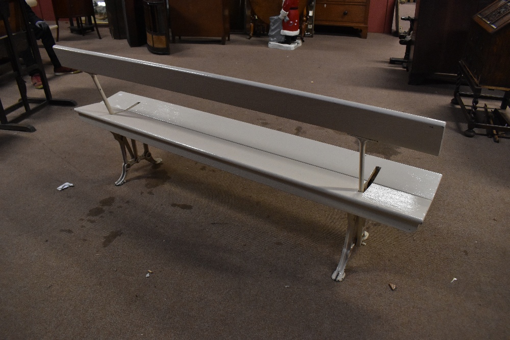 JOHN HEYWOOD LTD, MANCHESTER; a white painted cast iron adjustable railway bench with wooden back - Image 2 of 2