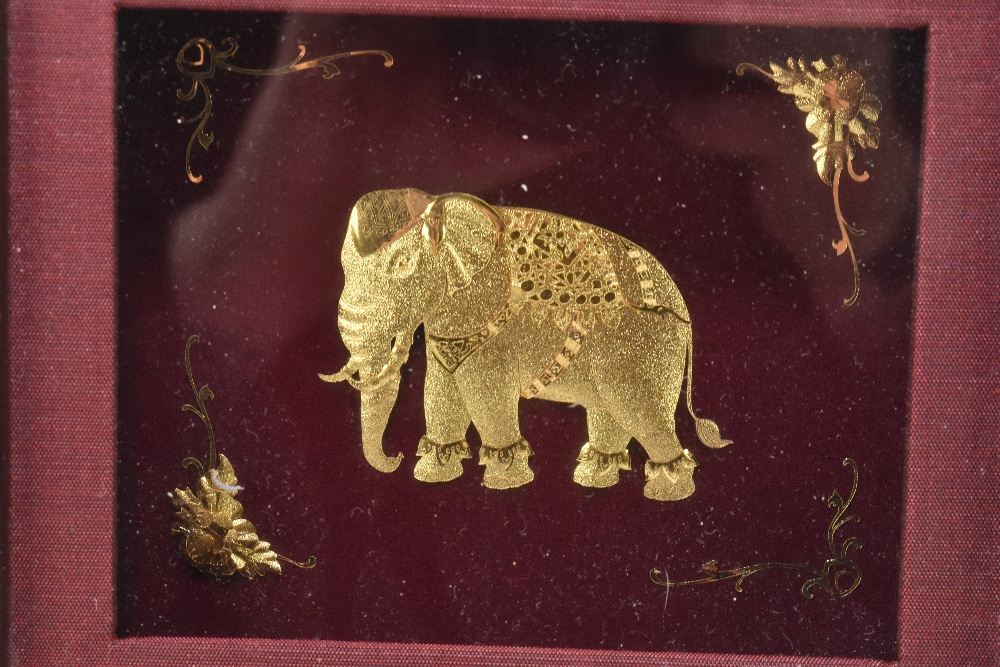 PRIMA ART; a gilt metal elephant, with applied floral detail, framed and glazed, 17.5cm x 20cm - Image 3 of 4