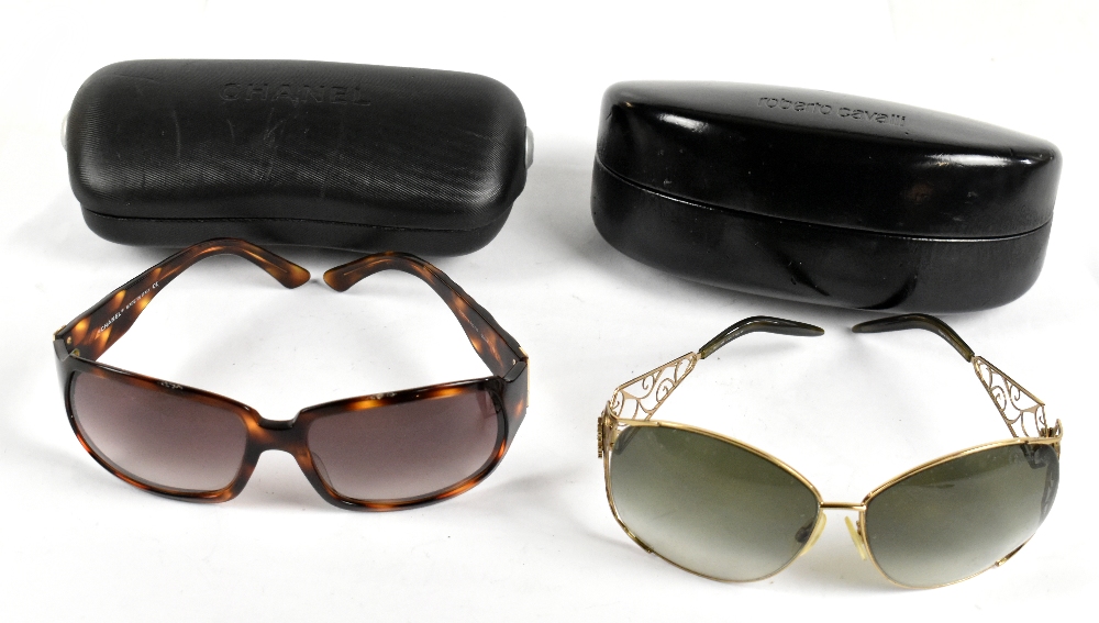 CHANEL; a pair of authentic tortoiseshell style sunglasses with quilted effect arms, maker's logo to
