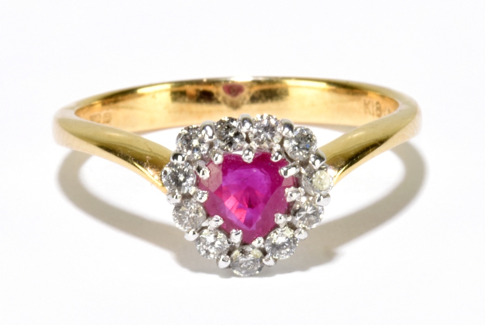 An 18ct yellow gold heart shaped ruby and diamond cluster ring, size L 1/2, approx. 2.8g.
