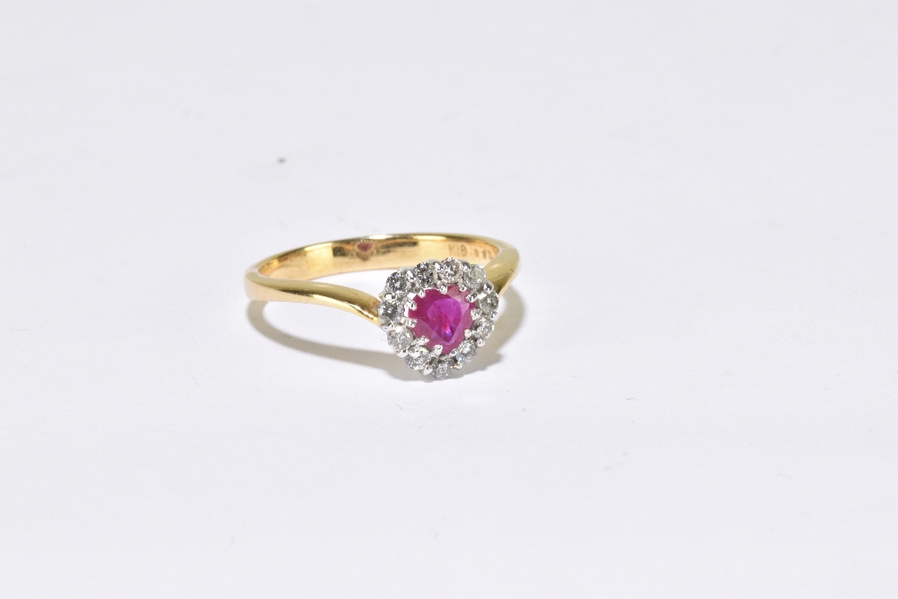 An 18ct yellow gold heart shaped ruby and diamond cluster ring, size L 1/2, approx. 2.8g. - Image 2 of 3