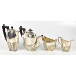 ROBERT PRINGLE & SON; a George V hallmarked silver four piece tea service, comprising teapot, hot