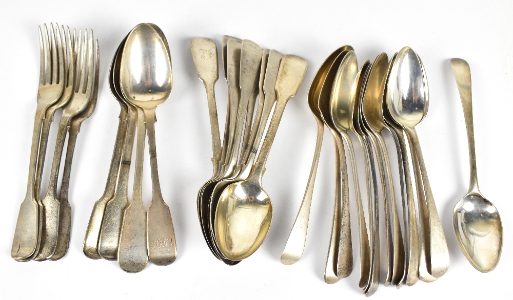 A collection of 19th century hallmarked silver dessert spoons, also teaspoons, and Fiddle pattern