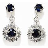 A pair of 18ct white gold sapphire and diamond cluster earrings, length of drop 20mm, approx 3.5g.