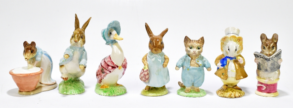 BESWICK; a collection of six Beatrix Potter figures including Amiable Guinea Pig, Tailor of