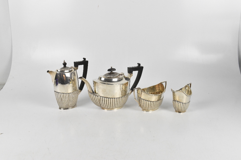 ROBERT PRINGLE & SON; a George V hallmarked silver four piece tea service, comprising teapot, hot - Image 2 of 3