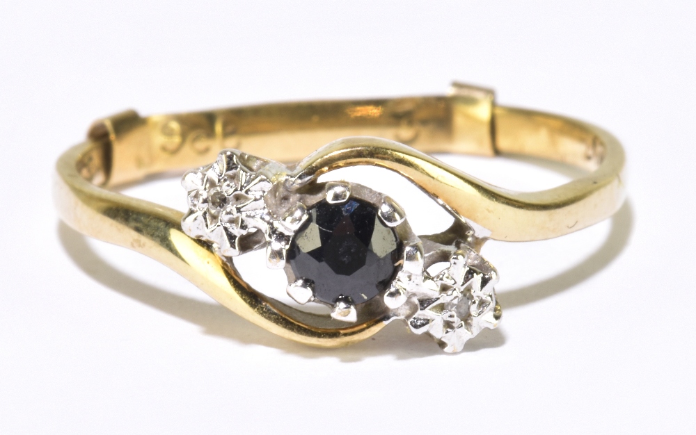 A 9ct diamond and sapphire three stone dress ring, size approx R/S, gross weight 2g