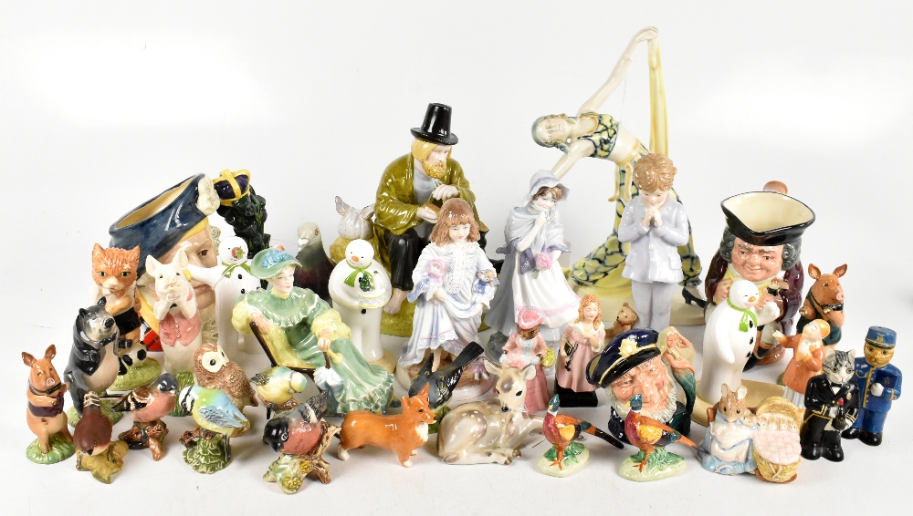 A collection of various ceramic figures, including Beswick pigs, Coalport snowmen, a Royal Doulton