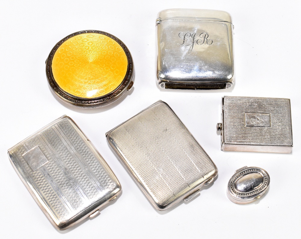 A group of small silver comprising a George V hallmarked silver and yellow/orange enamel decorated