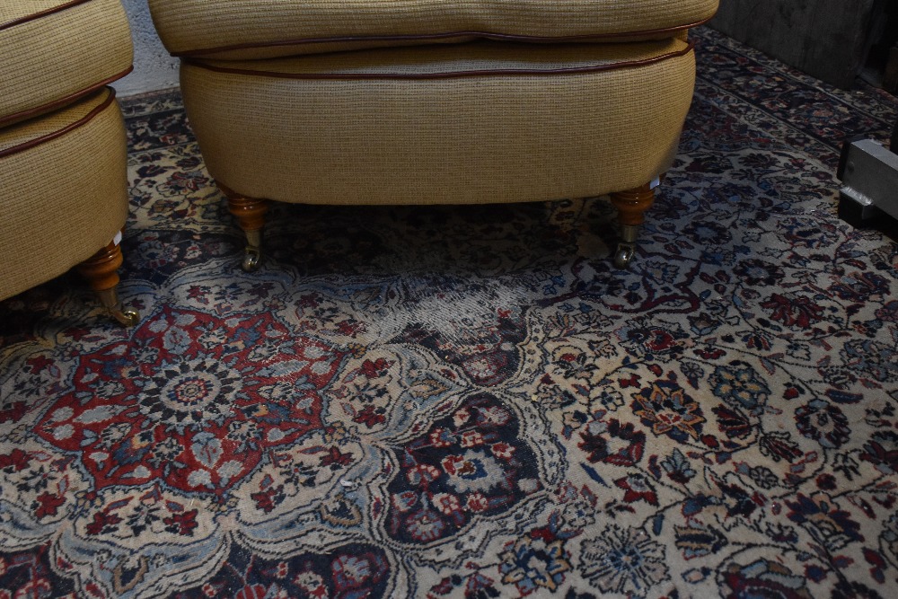 A pair of good quality reproduction armchairs on turned supports with brass castors. - Image 4 of 5