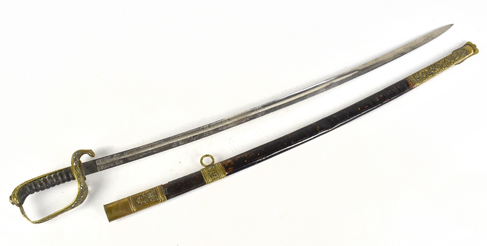 A late 19th century cavalry Officer's sword, with 81cm acid etched blade, shagreen grip and brass