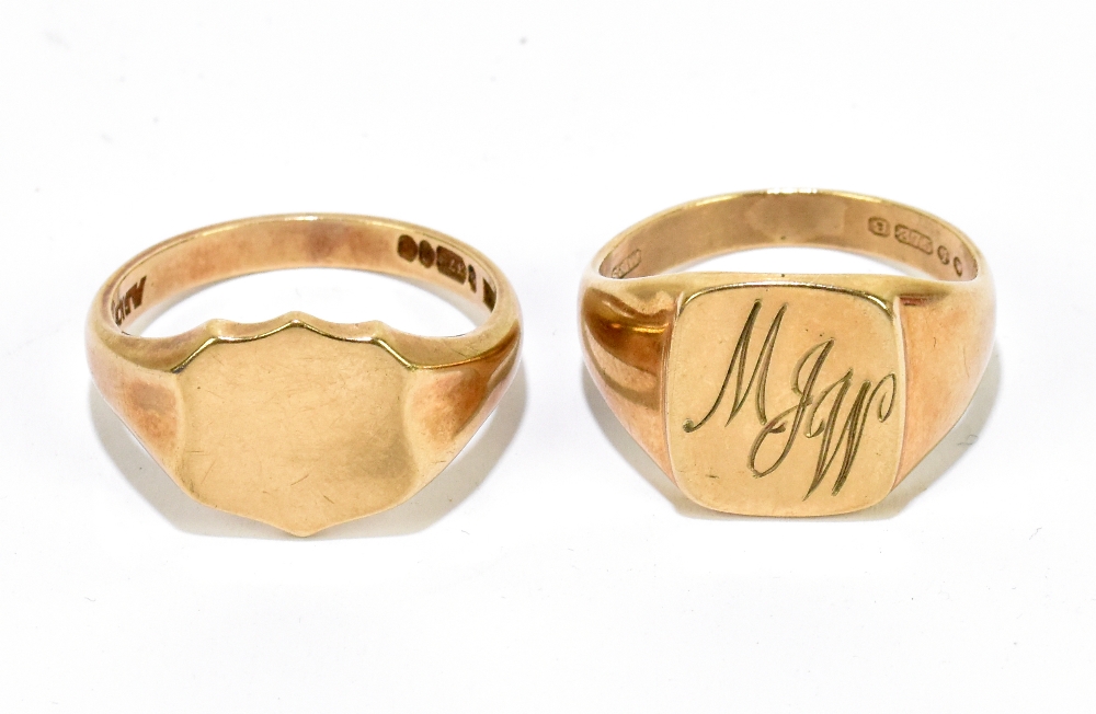 Two 9ct yellow gold signet rings, one with engraved initials 'MJW', size X, the shield shaped