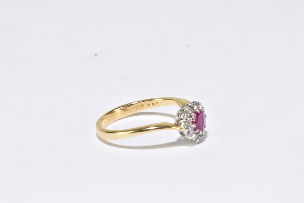 An 18ct yellow gold heart shaped ruby and diamond cluster ring, size L 1/2, approx. 2.8g. - Image 3 of 3