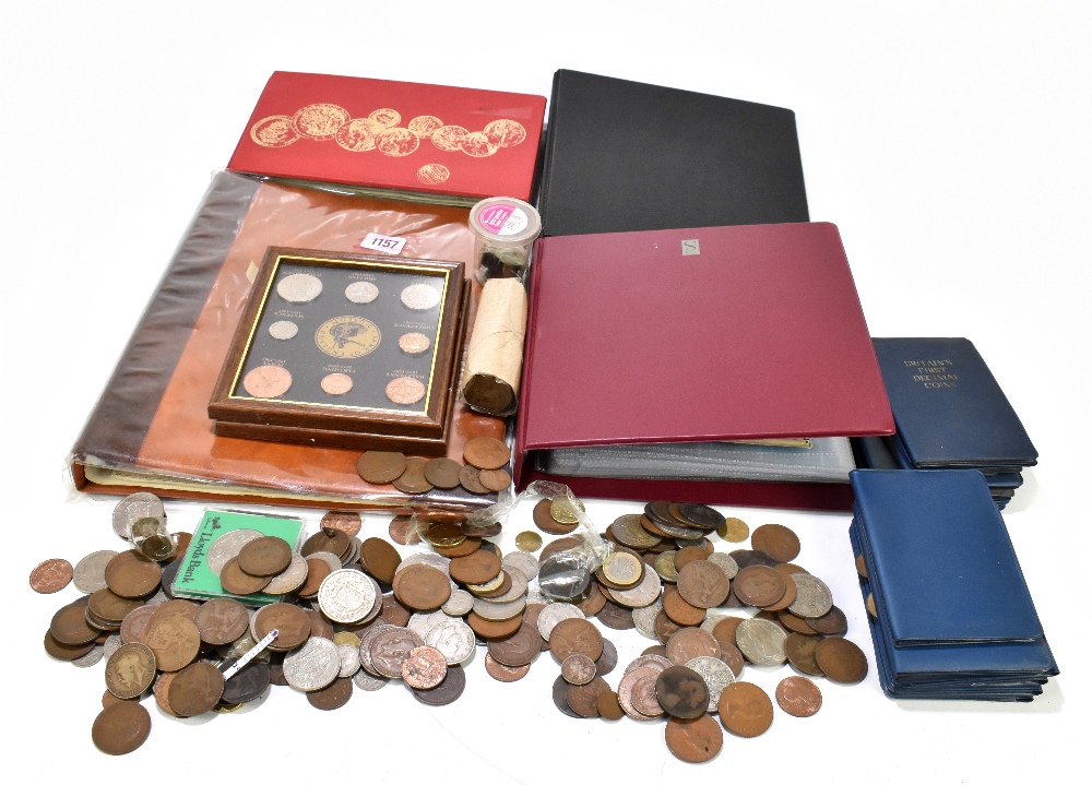 An assortment of pre-decimal copper and cupronickel British and World coins, loose and in albums,