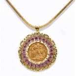 An Edward VII full sovereign, 1902, Perth Mint, in elaborate pierced frame and suspended on 9ct